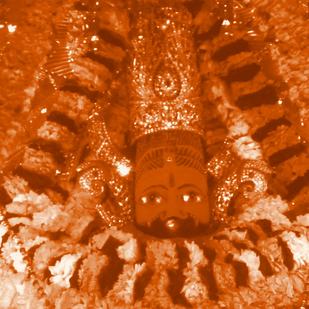 Shyam Baba's idol at the Reengus temple, in the site's orange duotone